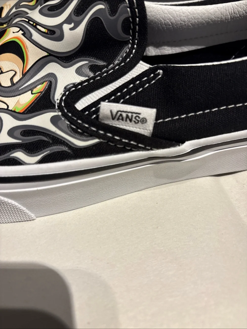 Vans Black & White Skull Flame Slip-On Loafers